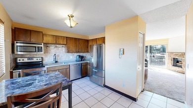 Wake up to mountain views and fresh alpine air in this 2-bedroom on Lake Estes Golf Course in Colorado - for sale on GolfHomes.com, golf home, golf lot