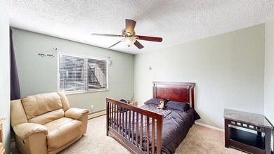 Wake up to mountain views and fresh alpine air in this 2-bedroom on Lake Estes Golf Course in Colorado - for sale on GolfHomes.com, golf home, golf lot