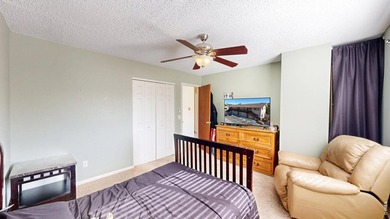 Wake up to mountain views and fresh alpine air in this 2-bedroom on Lake Estes Golf Course in Colorado - for sale on GolfHomes.com, golf home, golf lot