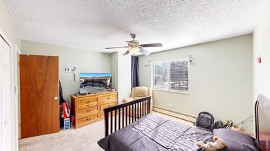 Wake up to mountain views and fresh alpine air in this 2-bedroom on Lake Estes Golf Course in Colorado - for sale on GolfHomes.com, golf home, golf lot