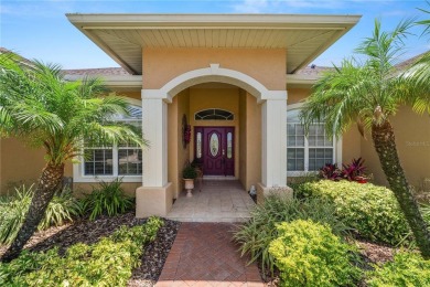 This is an immaculate 4 bedroom / 3 Bathroom one level Pool home on Grasslands Golf and Country Club in Florida - for sale on GolfHomes.com, golf home, golf lot