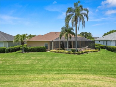 This is an immaculate 4 bedroom / 3 Bathroom one level Pool home on Grasslands Golf and Country Club in Florida - for sale on GolfHomes.com, golf home, golf lot