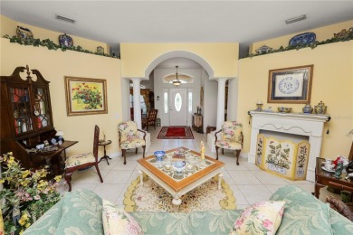 This is an immaculate 4 bedroom / 3 Bathroom one level Pool home on Grasslands Golf and Country Club in Florida - for sale on GolfHomes.com, golf home, golf lot