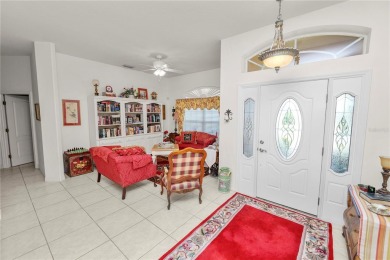 This is an immaculate 4 bedroom / 3 Bathroom one level Pool home on Grasslands Golf and Country Club in Florida - for sale on GolfHomes.com, golf home, golf lot