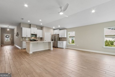 Welcome to 108 Angler Lane, a nearly new five-bedroom on The Club At Osprey Cove in Georgia - for sale on GolfHomes.com, golf home, golf lot