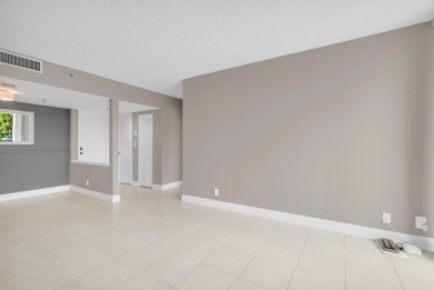 Light and Bright, Unfurnished 2 bedroom, 2 bathroom condo inside on Boca West Golf and Country Club in Florida - for sale on GolfHomes.com, golf home, golf lot