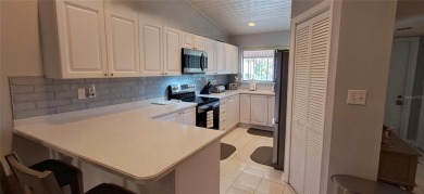 Step into this spacious, beautifully renovated, end-unit condo on Lake Wales Country Club in Florida - for sale on GolfHomes.com, golf home, golf lot