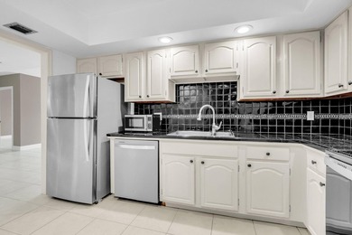 Light and Bright, 2 bedroom, 2 bathroom condo inside the famed on Boca West Golf and Country Club in Florida - for sale on GolfHomes.com, golf home, golf lot