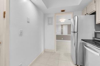 Light and Bright, Unfurnished 2 bedroom, 2 bathroom condo inside on Boca West Golf and Country Club in Florida - for sale on GolfHomes.com, golf home, golf lot