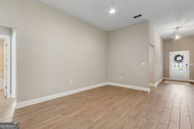 Welcome to 108 Angler Lane, a nearly new five-bedroom on The Club At Osprey Cove in Georgia - for sale on GolfHomes.com, golf home, golf lot