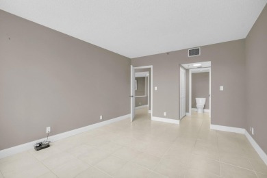 Light and Bright, Unfurnished 2 bedroom, 2 bathroom condo inside on Boca West Golf and Country Club in Florida - for sale on GolfHomes.com, golf home, golf lot