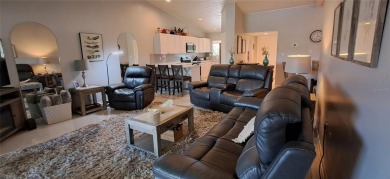 Step into this spacious, beautifully renovated, end-unit condo on Lake Wales Country Club in Florida - for sale on GolfHomes.com, golf home, golf lot