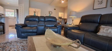 Step into this spacious, beautifully renovated, end-unit condo on Lake Wales Country Club in Florida - for sale on GolfHomes.com, golf home, golf lot