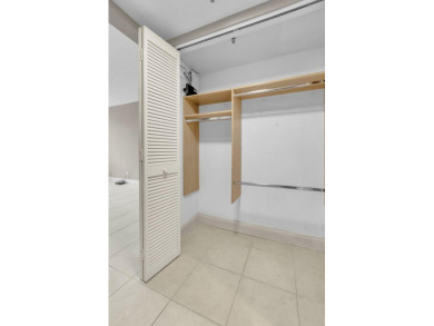 Light and Bright, Unfurnished 2 bedroom, 2 bathroom condo inside on Boca West Golf and Country Club in Florida - for sale on GolfHomes.com, golf home, golf lot