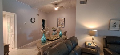 Step into this spacious, beautifully renovated, end-unit condo on Lake Wales Country Club in Florida - for sale on GolfHomes.com, golf home, golf lot