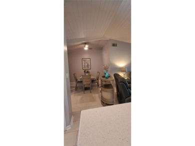 Step into this spacious, beautifully renovated, end-unit condo on Lake Wales Country Club in Florida - for sale on GolfHomes.com, golf home, golf lot