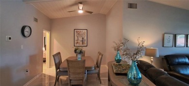 Step into this spacious, beautifully renovated, end-unit condo on Lake Wales Country Club in Florida - for sale on GolfHomes.com, golf home, golf lot