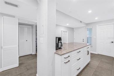 Waterfront Condo with Sweeping Pass-A-Grille Channel Views - on Isla Del Sol Yacht and Country Club in Florida - for sale on GolfHomes.com, golf home, golf lot