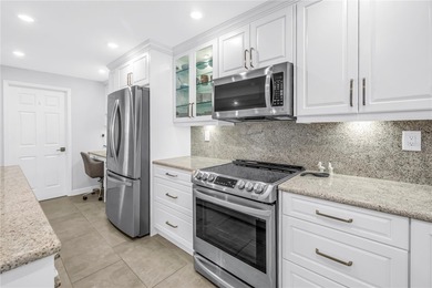 Waterfront Condo with Sweeping Pass-A-Grille Channel Views - on Isla Del Sol Yacht and Country Club in Florida - for sale on GolfHomes.com, golf home, golf lot