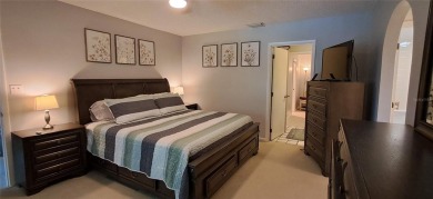 Step into this spacious, beautifully renovated, end-unit condo on Lake Wales Country Club in Florida - for sale on GolfHomes.com, golf home, golf lot