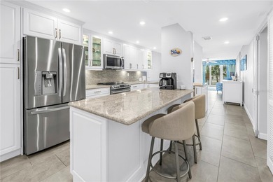 Waterfront Condo with Sweeping Pass-A-Grille Channel Views - on Isla Del Sol Yacht and Country Club in Florida - for sale on GolfHomes.com, golf home, golf lot