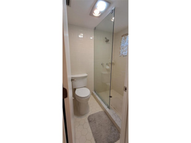 Step into this spacious, beautifully renovated, end-unit condo on Lake Wales Country Club in Florida - for sale on GolfHomes.com, golf home, golf lot