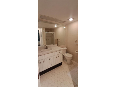 Step into this spacious, beautifully renovated, end-unit condo on Lake Wales Country Club in Florida - for sale on GolfHomes.com, golf home, golf lot