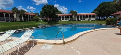 Step into this spacious, beautifully renovated, end-unit condo on Lake Wales Country Club in Florida - for sale on GolfHomes.com, golf home, golf lot