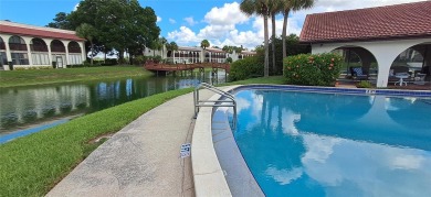 Step into this spacious, beautifully renovated, end-unit condo on Lake Wales Country Club in Florida - for sale on GolfHomes.com, golf home, golf lot