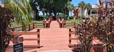 Step into this spacious, beautifully renovated, end-unit condo on Lake Wales Country Club in Florida - for sale on GolfHomes.com, golf home, golf lot