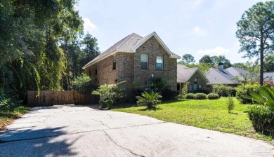 Charming 4-bedroom, 2.5-bath home in the highly sought-after on Marcus Pointe Golf Club in Florida - for sale on GolfHomes.com, golf home, golf lot