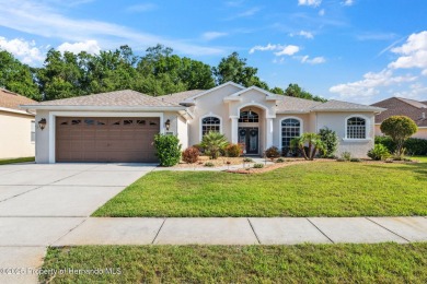 Tucked within the gated golfing community of Hernando Oaks, this on Hernando Oaks Golf and Country Club in Florida - for sale on GolfHomes.com, golf home, golf lot