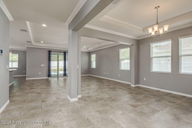 Welcome to this beautifully maintained 4-bedroom, 3.5-bathroom on Silverthorn Country Club in Florida - for sale on GolfHomes.com, golf home, golf lot
