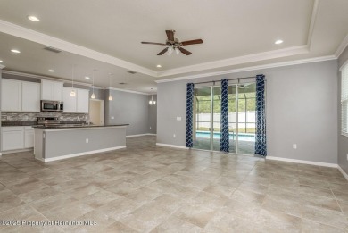 Welcome to this beautifully maintained 4-bedroom, 3.5-bathroom on Silverthorn Country Club in Florida - for sale on GolfHomes.com, golf home, golf lot