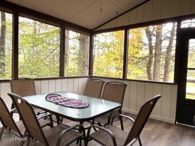 This simply sweet chalet getaway is nestled on a pretty forested on The Hideout Golf in Pennsylvania - for sale on GolfHomes.com, golf home, golf lot