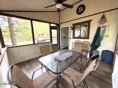 This simply sweet chalet getaway is nestled on a pretty forested on The Hideout Golf in Pennsylvania - for sale on GolfHomes.com, golf home, golf lot