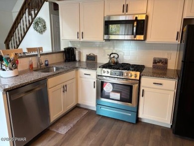 This simply sweet chalet getaway is nestled on a pretty forested on The Hideout Golf in Pennsylvania - for sale on GolfHomes.com, golf home, golf lot