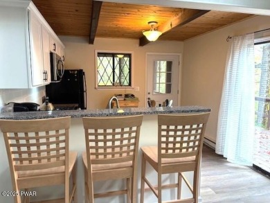 This simply sweet chalet getaway is nestled on a pretty forested on The Hideout Golf in Pennsylvania - for sale on GolfHomes.com, golf home, golf lot