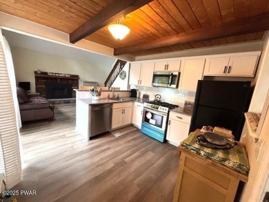 This simply sweet chalet getaway is nestled on a pretty forested on The Hideout Golf in Pennsylvania - for sale on GolfHomes.com, golf home, golf lot