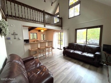 This simply sweet chalet getaway is nestled on a pretty forested on The Hideout Golf in Pennsylvania - for sale on GolfHomes.com, golf home, golf lot