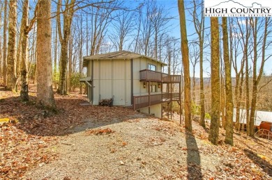 Charming Mountain Retreat: 3-Bedroom, 2-Bath Round House on Beech Mountain Club in North Carolina - for sale on GolfHomes.com, golf home, golf lot