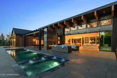 Welcome to a meticulously crafted masterpiece overlooking the on Gozzer Ranch Golf and Lake Club in Idaho - for sale on GolfHomes.com, golf home, golf lot