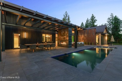 Welcome to a meticulously crafted masterpiece overlooking the on Gozzer Ranch Golf and Lake Club in Idaho - for sale on GolfHomes.com, golf home, golf lot