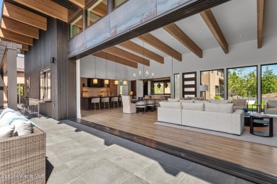 Welcome to a meticulously crafted masterpiece overlooking the on Gozzer Ranch Golf and Lake Club in Idaho - for sale on GolfHomes.com, golf home, golf lot
