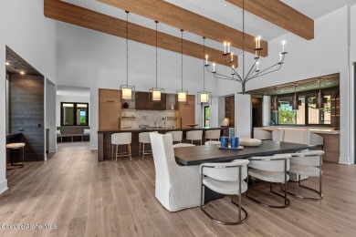 Welcome to a meticulously crafted masterpiece overlooking the on Gozzer Ranch Golf and Lake Club in Idaho - for sale on GolfHomes.com, golf home, golf lot