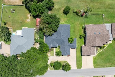 This beautiful home offers split bedrooms setting, 3 bedrooms, 2 on Cedar Creek Country Club in Texas - for sale on GolfHomes.com, golf home, golf lot