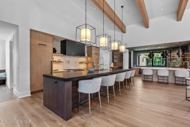 Welcome to a meticulously crafted masterpiece overlooking the on Gozzer Ranch Golf and Lake Club in Idaho - for sale on GolfHomes.com, golf home, golf lot