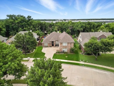 Experience lakeside living at its finest in this 6-bedroom, 4 on Stewart Peninsula Golf Course in Texas - for sale on GolfHomes.com, golf home, golf lot