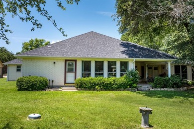 This beautiful home offers split bedrooms setting, 3 bedrooms, 2 on Cedar Creek Country Club in Texas - for sale on GolfHomes.com, golf home, golf lot