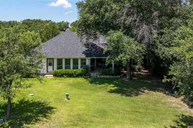 This beautiful home offers split bedrooms setting, 3 bedrooms, 2 on Cedar Creek Country Club in Texas - for sale on GolfHomes.com, golf home, golf lot